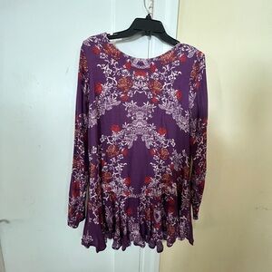 Free People mini dress size M.  Multicolor with open back and long sleeves.